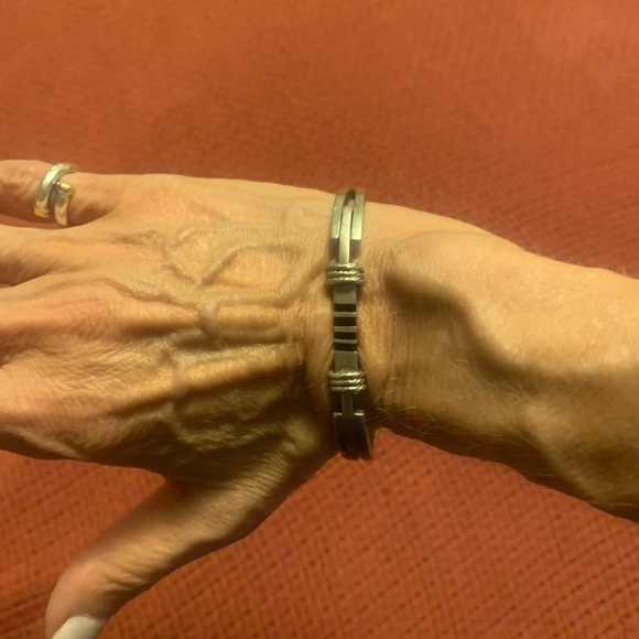 Silver tone bracelet with black accents. Fits small wrist. - Picture 10 of 13